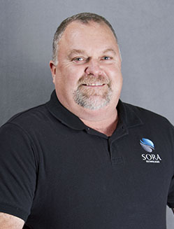 Photo of Russell L. Adams, Chief Executive Officer of Sora Technologies